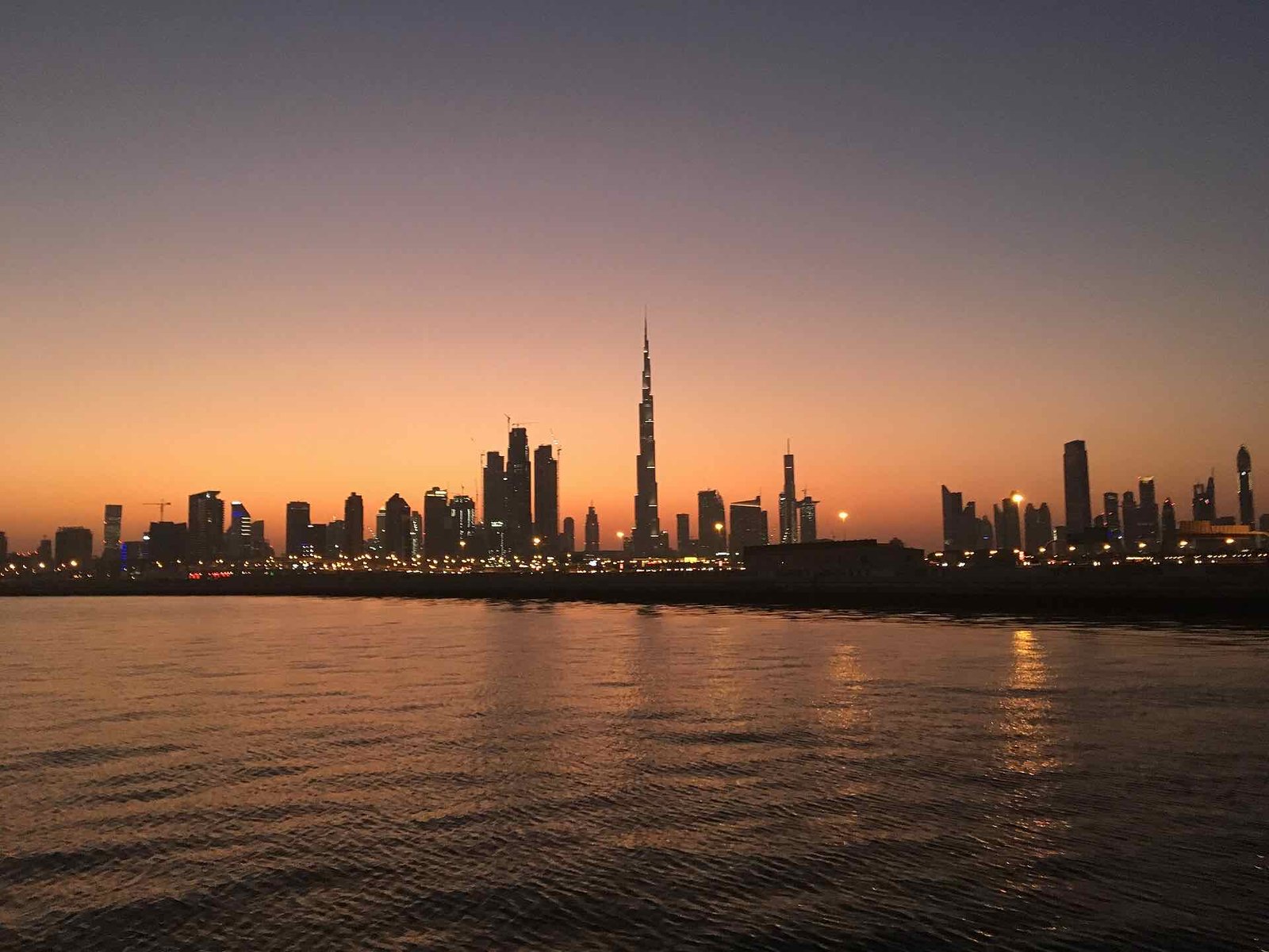 Business Bay and Downtown Dubai skyline at sunset (location photo)