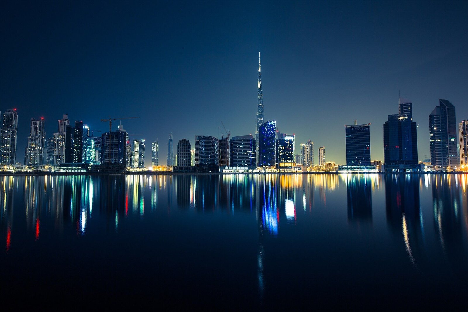 Business Bay skyline and Burj Khalifa at night, Dubai (location photo)