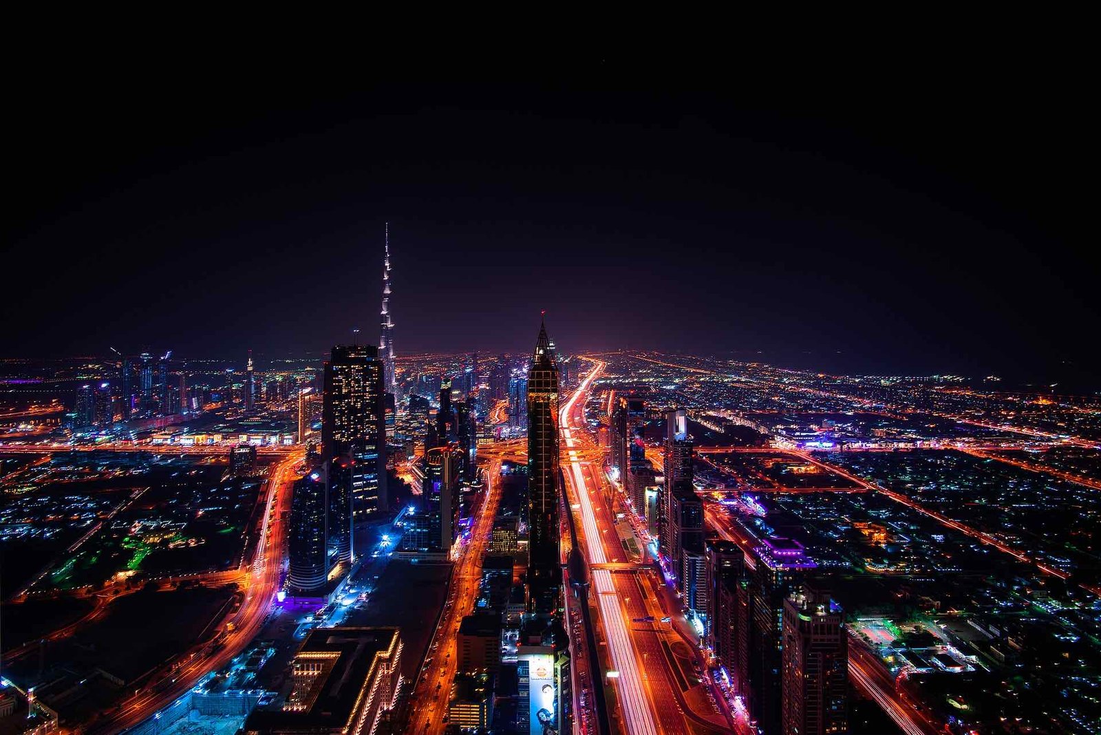 Aerial night view of Sheikh Zayed Road and Downtown Dubai near Business Bay (location photo)