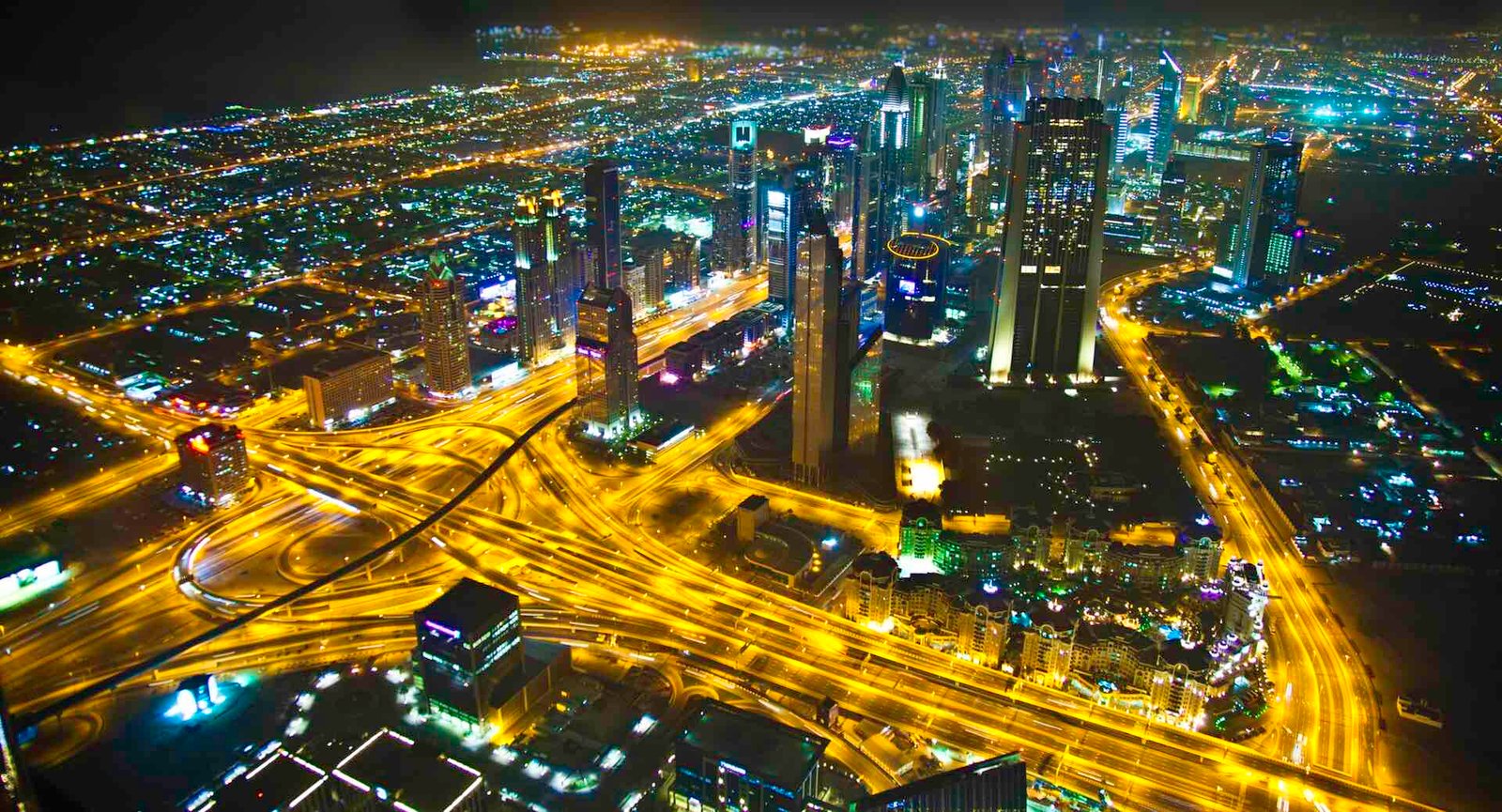 Dubai business district at night seen from Burj Khalifa